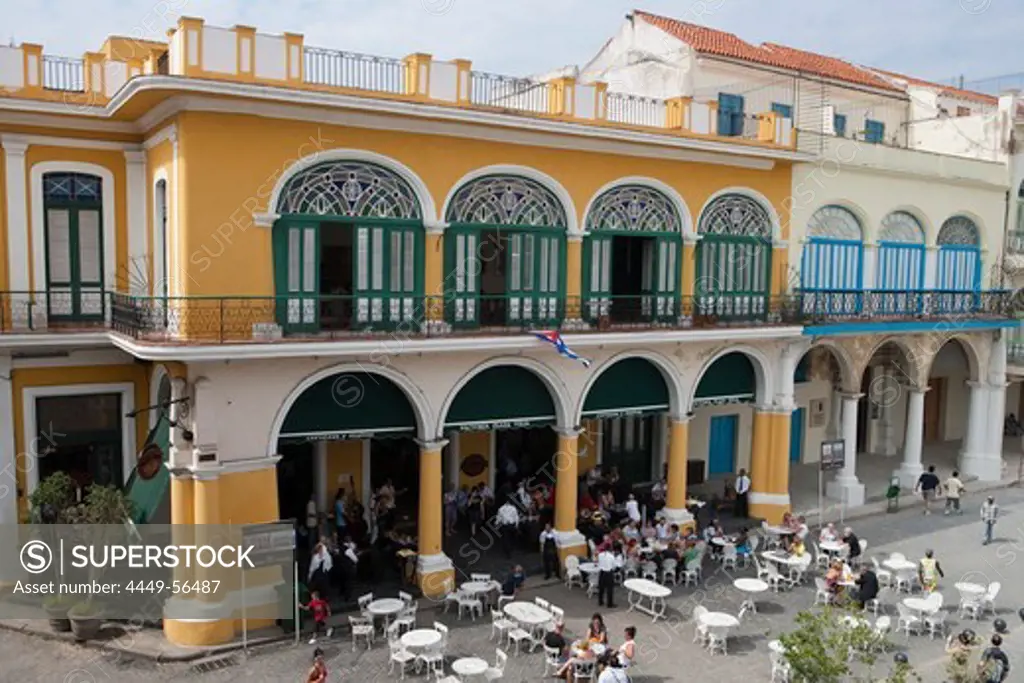 People sitting outside and live music at Taberna de la Muralla Brewery Bar and Restaurant on Plaza Vieja, City of Havana, Havana, Cuba