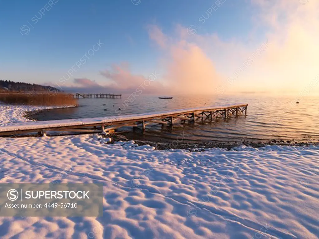 Winter scenery in Gstadt at sunset, Chiemsee, Bavaria, Germany