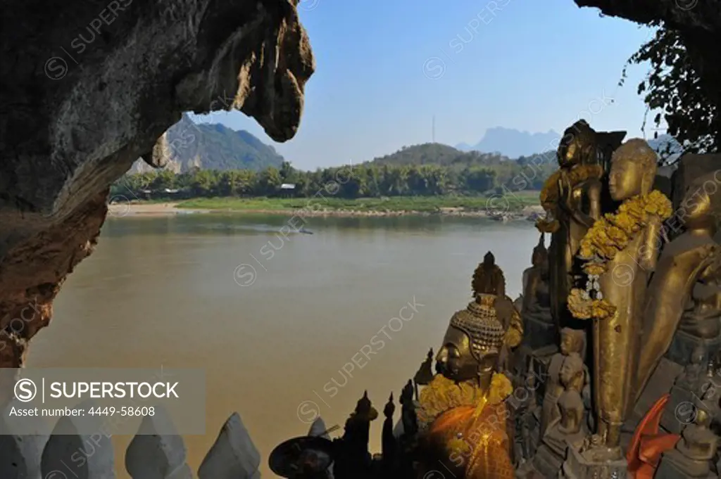 Buddha statues, Pak Ou caves, Mekong river, north of Luang Prabang, Laos
