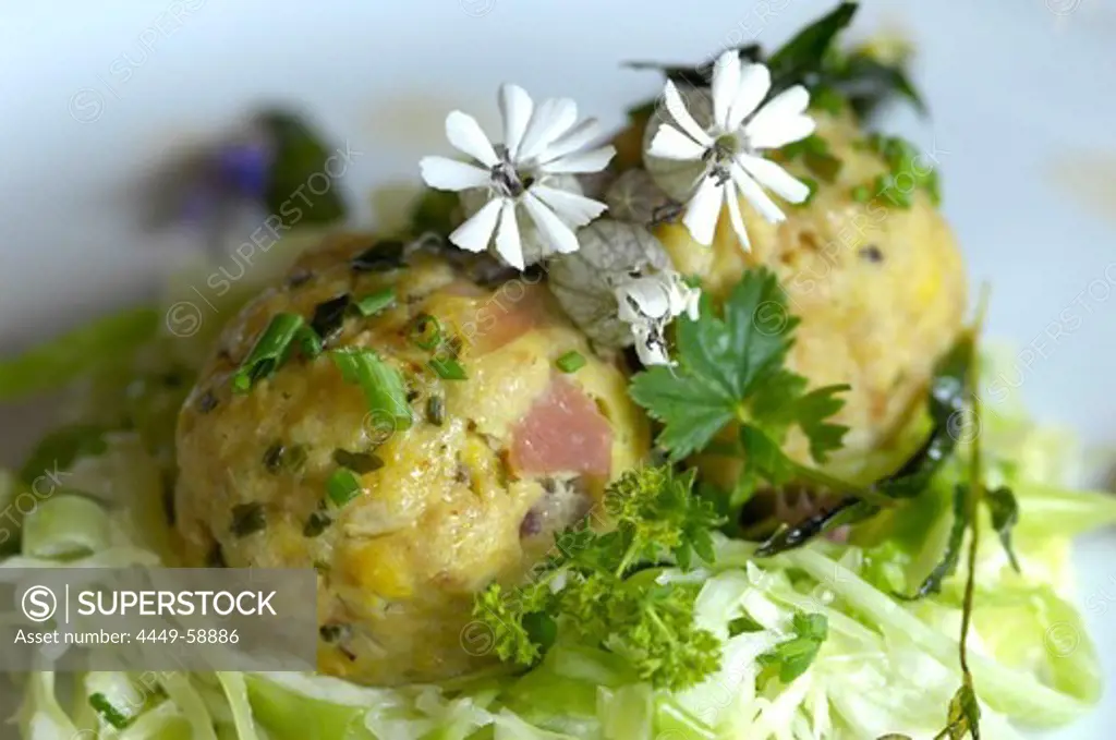 Close up of dumplings with coleslaw, Alto Adige, South Tyrol, Italy, Europe