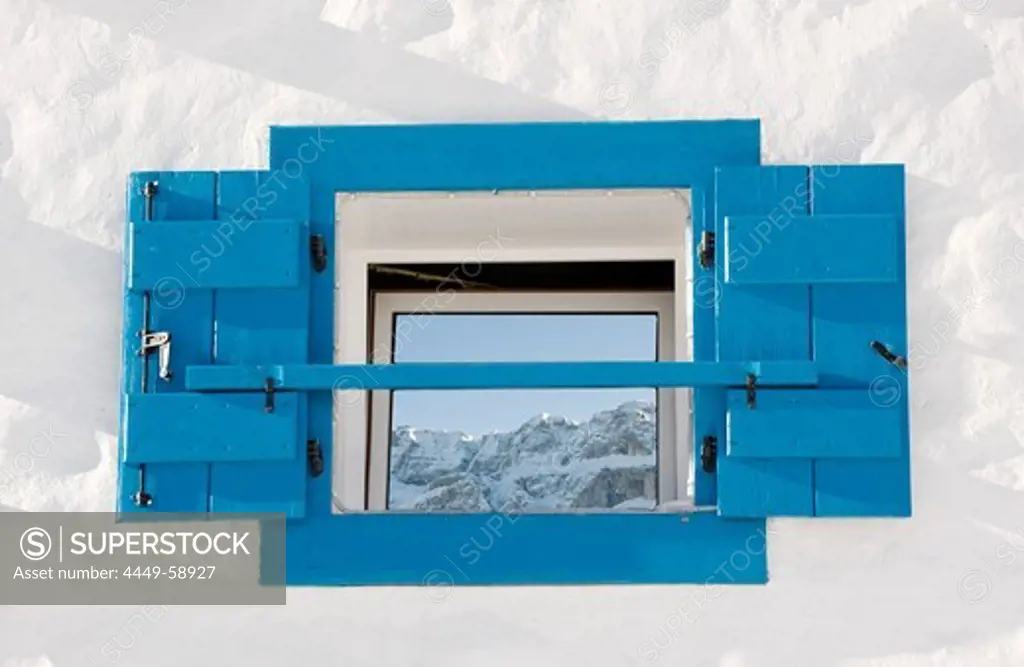 Reflection of snowy mountains on a window pane, Alto Adige, South Tyrol, Italy, Europe