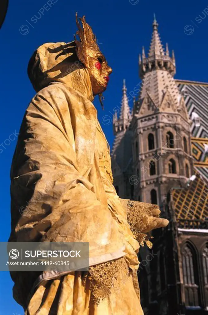 Street performer against Stephansdom, Vienna, Austria