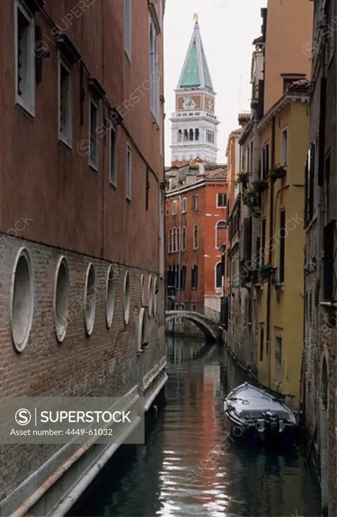 Canal between houses with bridge and spire, Venice, Venezia, Italy