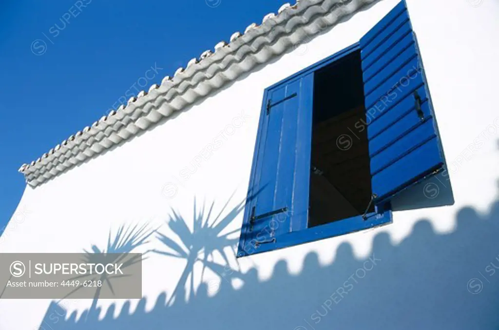 Window and shadows on the wall of a house, Koroni, Messinia, Peloponnese, Greece