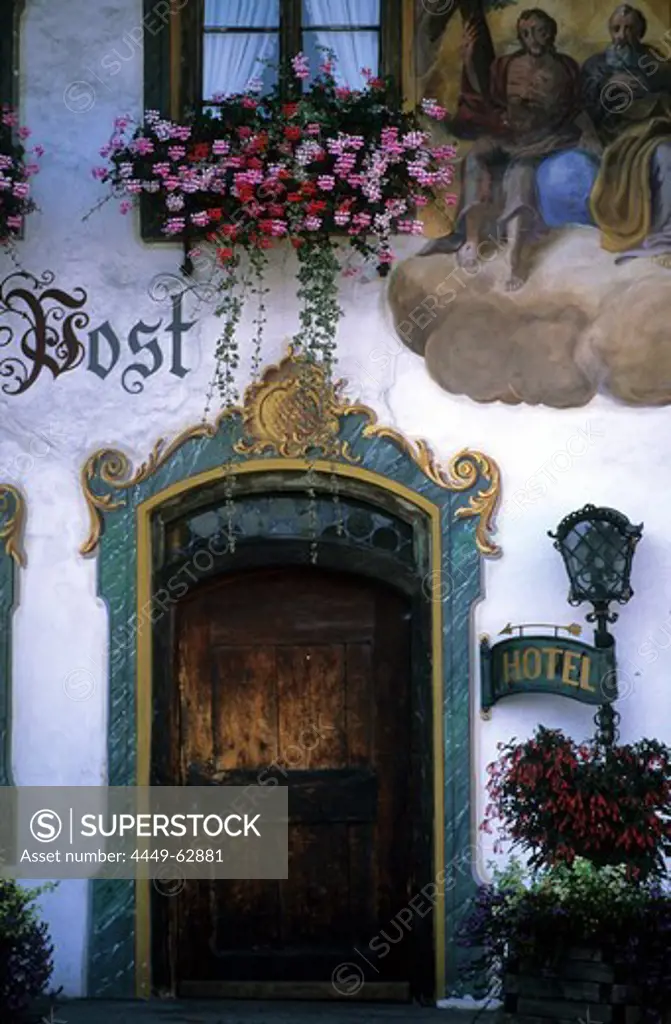House decorated with traditional painting Lueftlmalerei in the village of Wallgau, Bavaria, Germany