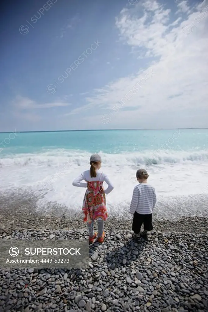 Girl and boy on the beach at Nice, Cote d'Azur, Provence, France