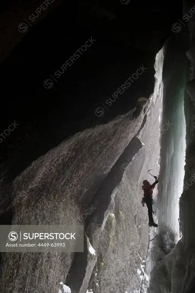 A man ice climbing in a cave, Sounkyo, Hokkaido, Japan, Asia