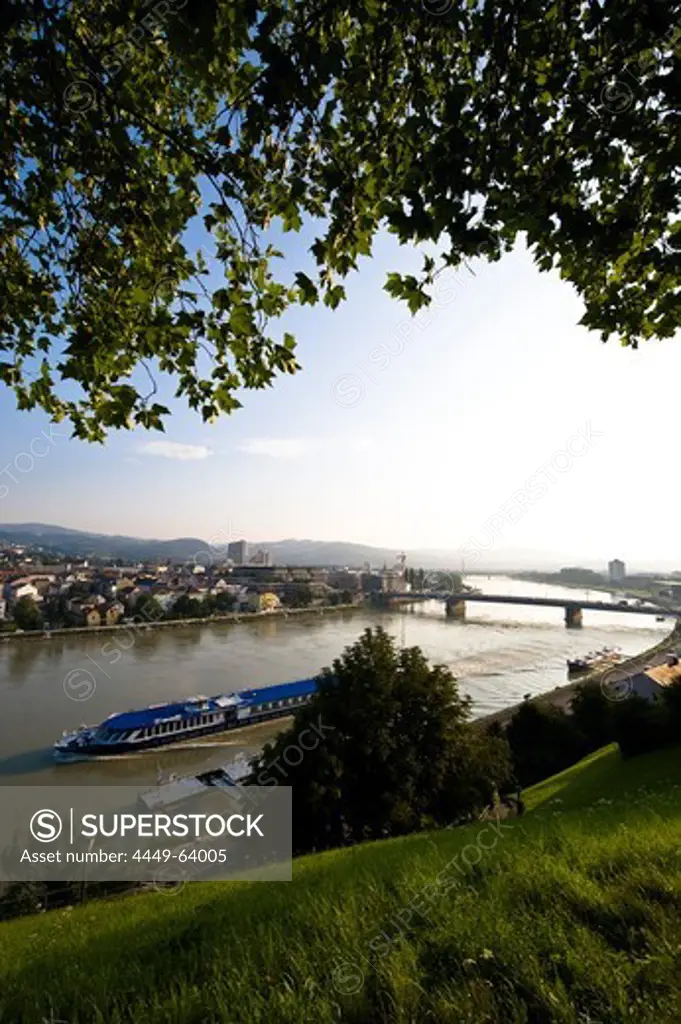 View from Schlossberg at the Danube with excursion boat and Nibelungen bridge, Linz, Upper Austria, Austria
