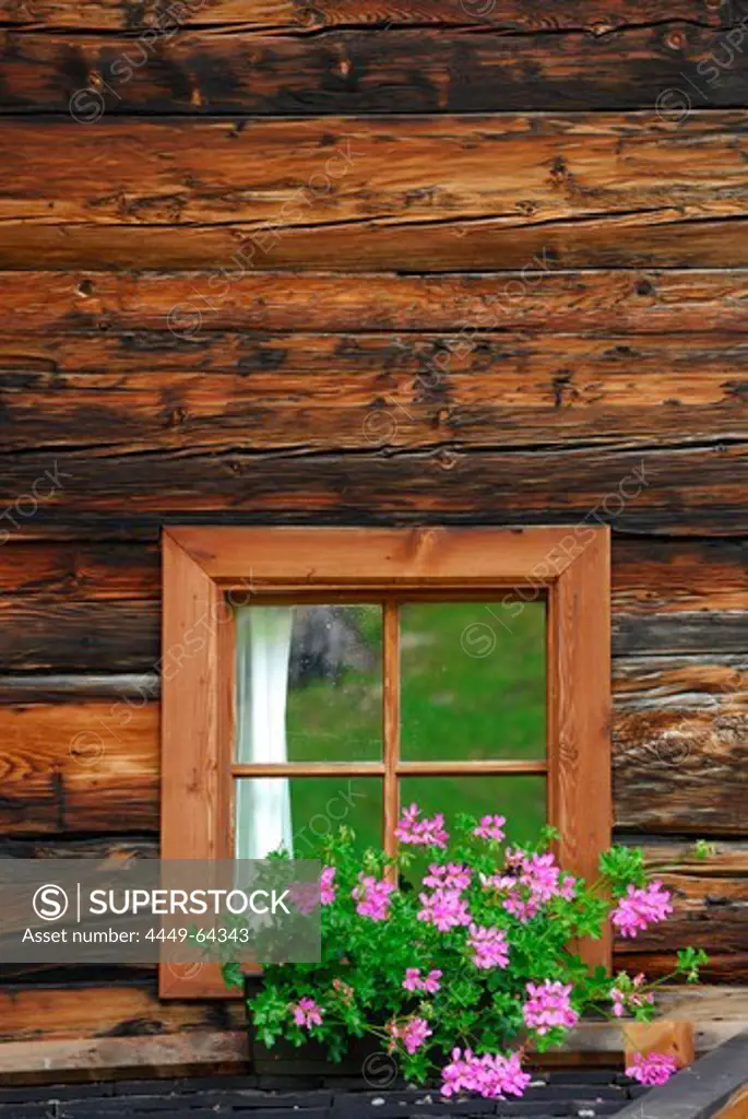 flower decorated window at farmhouse, Oetztal range, South Tyrol, Italy