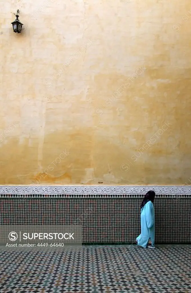 Moroccan woman at Moulay Ismail mausoleum, Meknes, Morocco, Africa