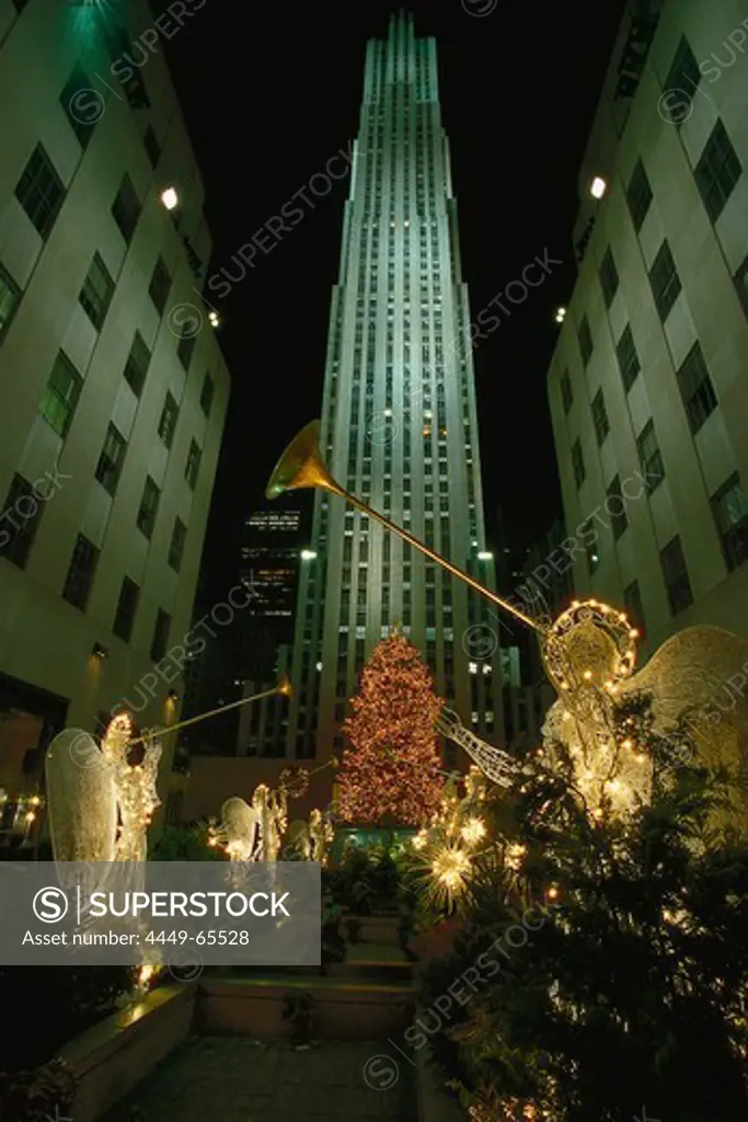 Christmas decoration in front of Rockefeller Center at night, Manhattan, New York City USA, America