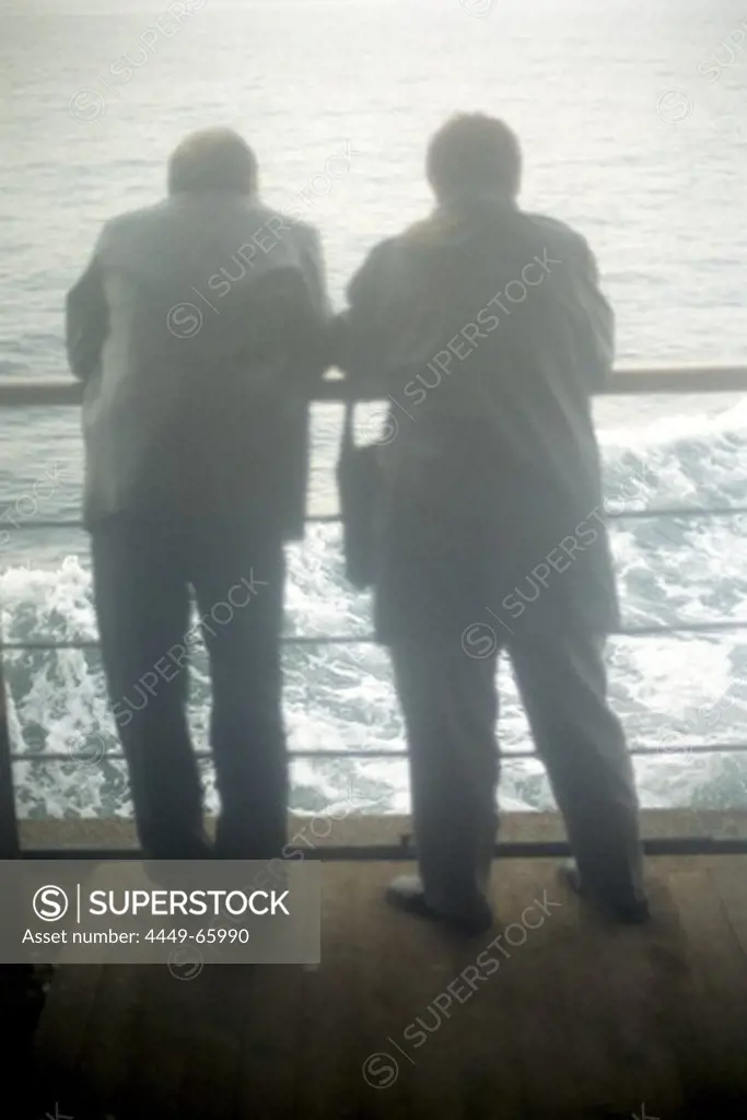 Senior couple at railing of ferry on Bosporus, Istanbul, Turkey
