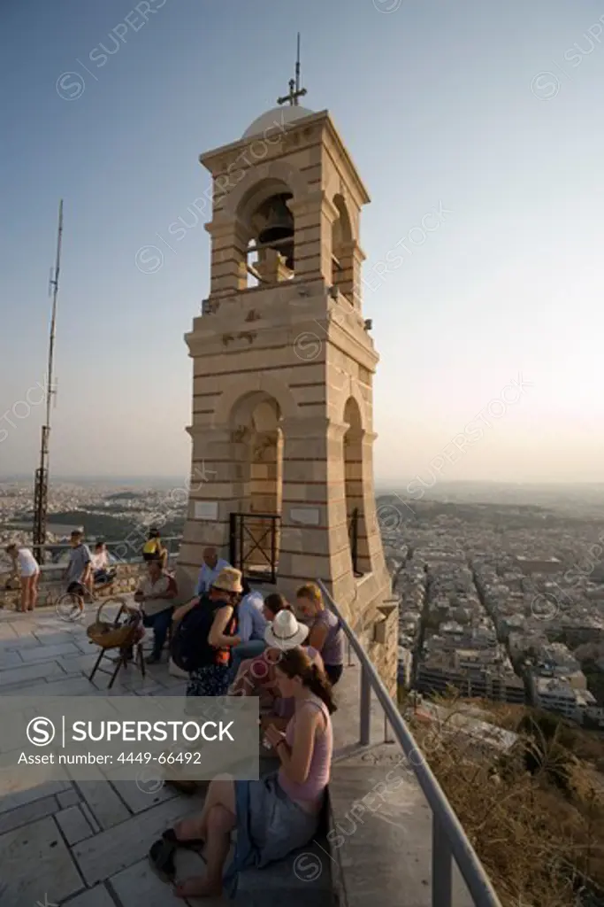 People visiting the Agios Georgios Chapel on the Lykavittos Hill, at viewing point near bell tower, Athens, Athens-Piraeus, Greece