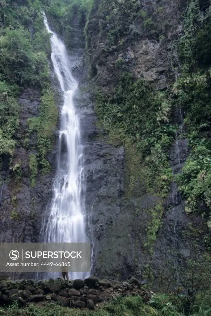 Woman at Vaimahuta Cascade Waterfall, Tahiti, French Polynesia