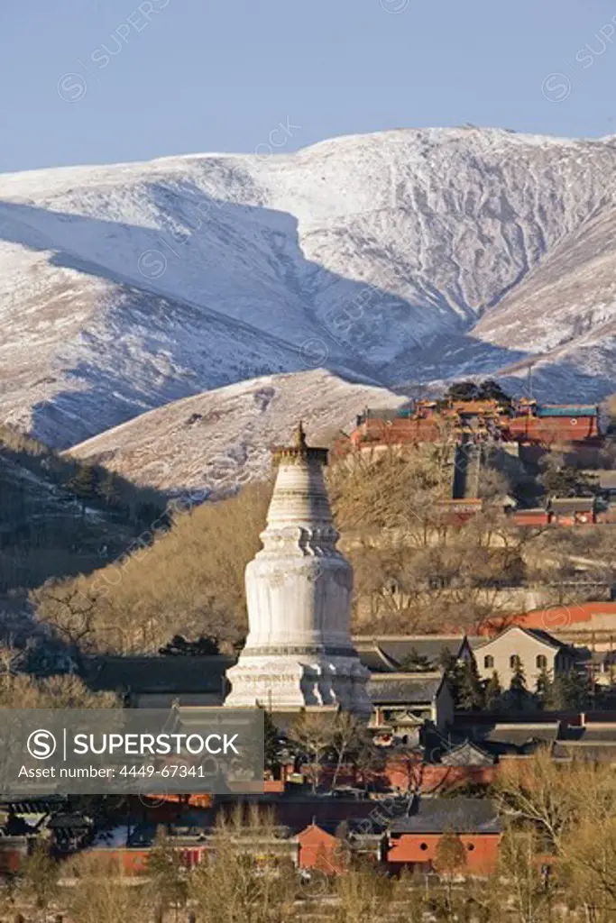 Mountains of Wutai Shan in winter snow, Five Terrace Mountain, Great White Pagoda, Northern Terrace, Buddhist Centre, town of Taihuai, Shanxi province, China, Asia