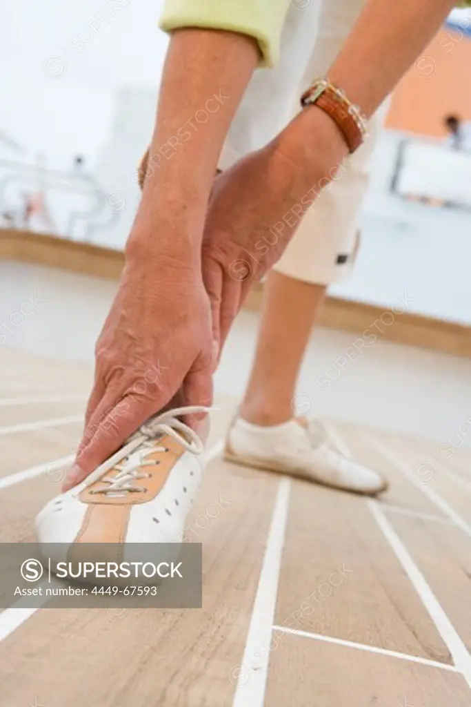 Old woman doing gymnastics