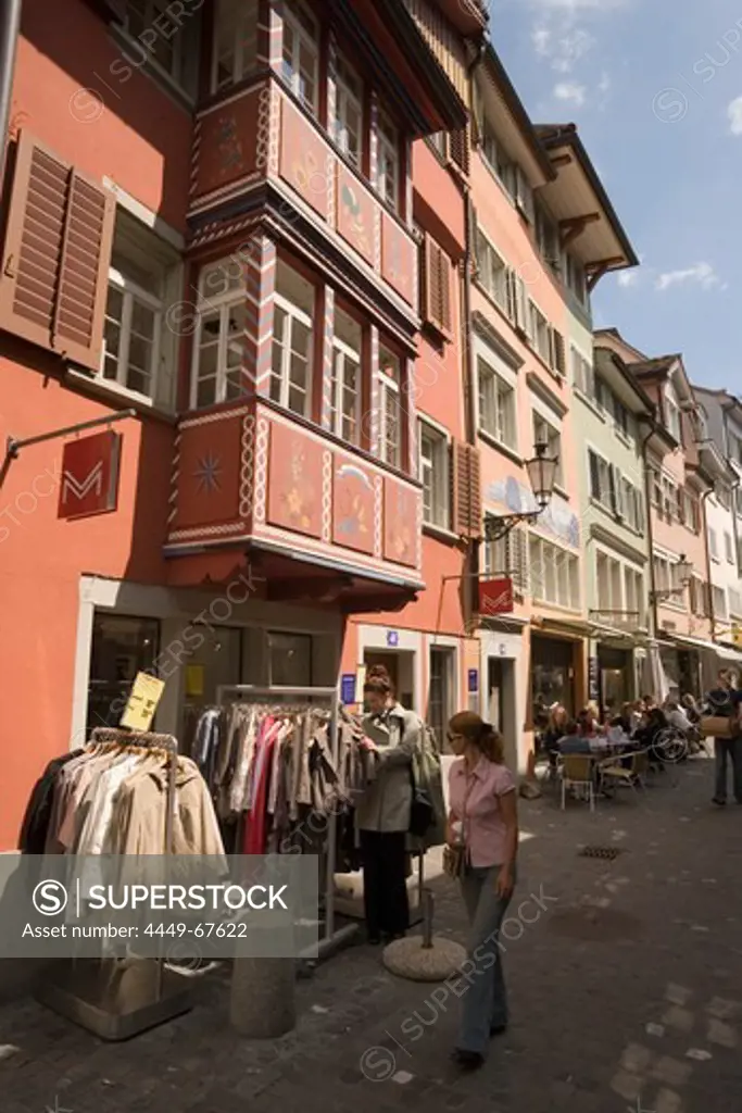 Woman passing a boutique, Augustinergasse, Zurich, Canton Zurich, Switzerland