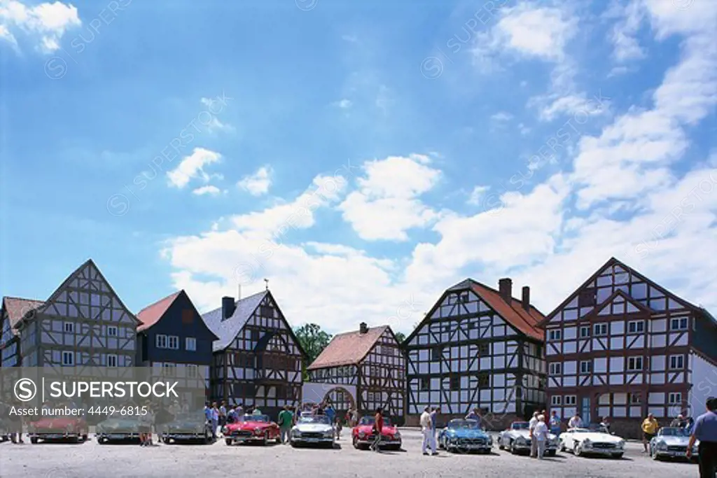 Car show and old half timbered houses in the sunlight, Open Air Museum Hessenpark, Taunus, Hesse, Germany, Europe