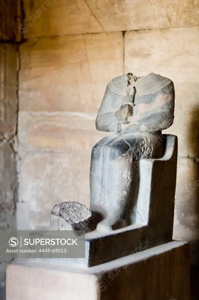 A headless statue, Karnak Temple, Luxor, Egypt
