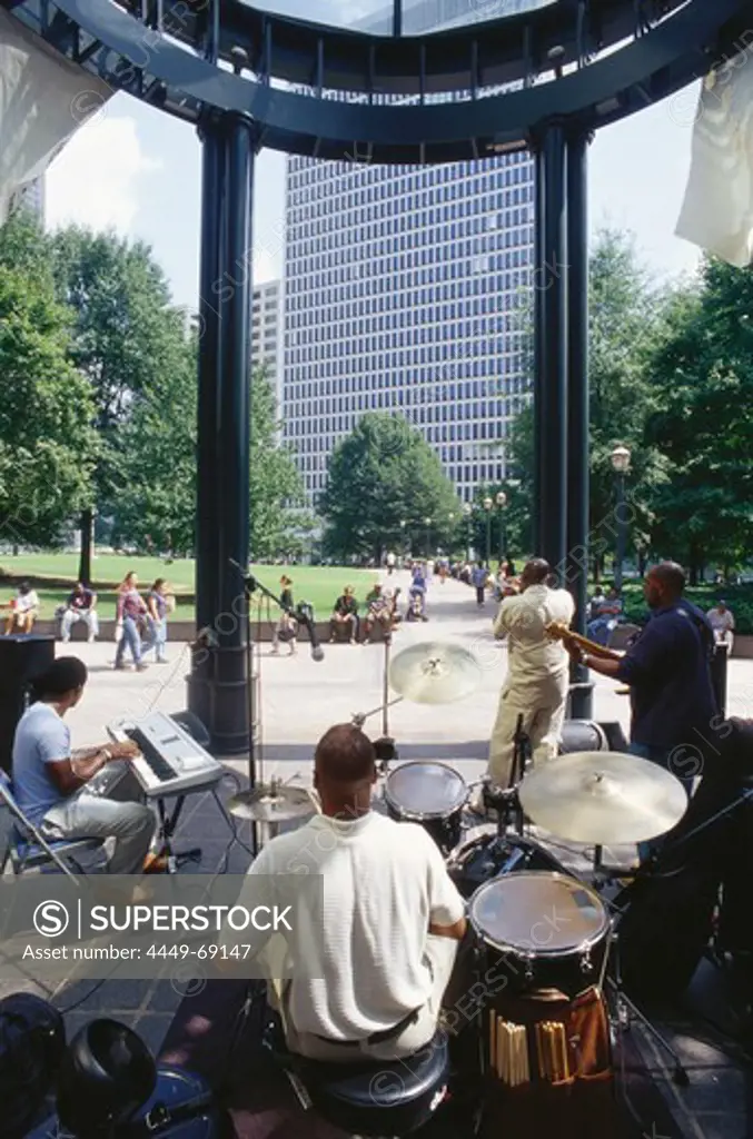 Band playing in a park at a Midday concert, Peachtree Street, Downtoan, Atlanta, georgia, USA