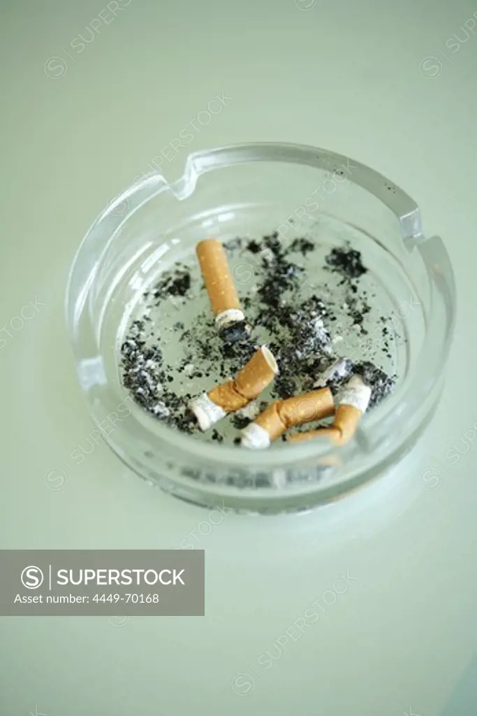Cigarette butts in an ash tray, Close-up