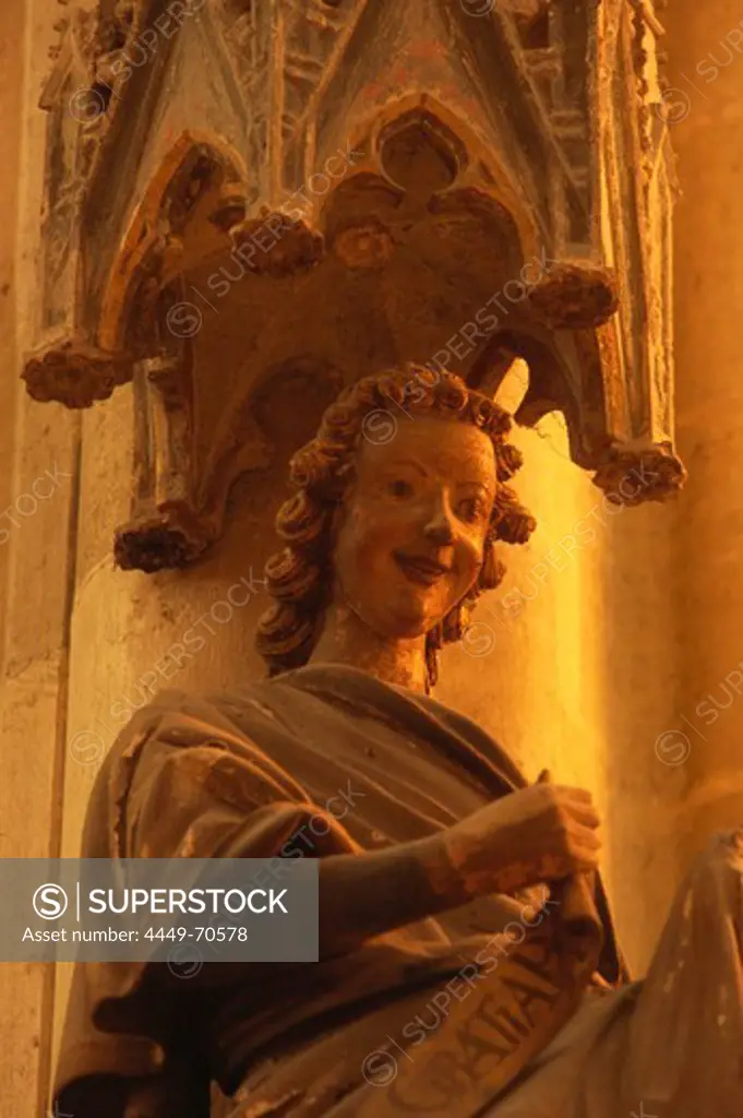 Gothic sculpture of an angel in the Cathedral Saint Peter, Regensburg, Upper Palatinate, Bavaria, Germany