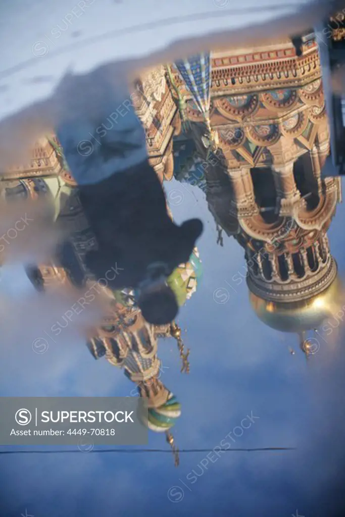 Cathedral of the Resurrection of Christ reflected in a puddle, St. Petersburg, Russia