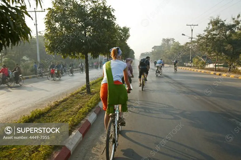 Cycle tour group, Bago mainstreet, Burma, Myanmar