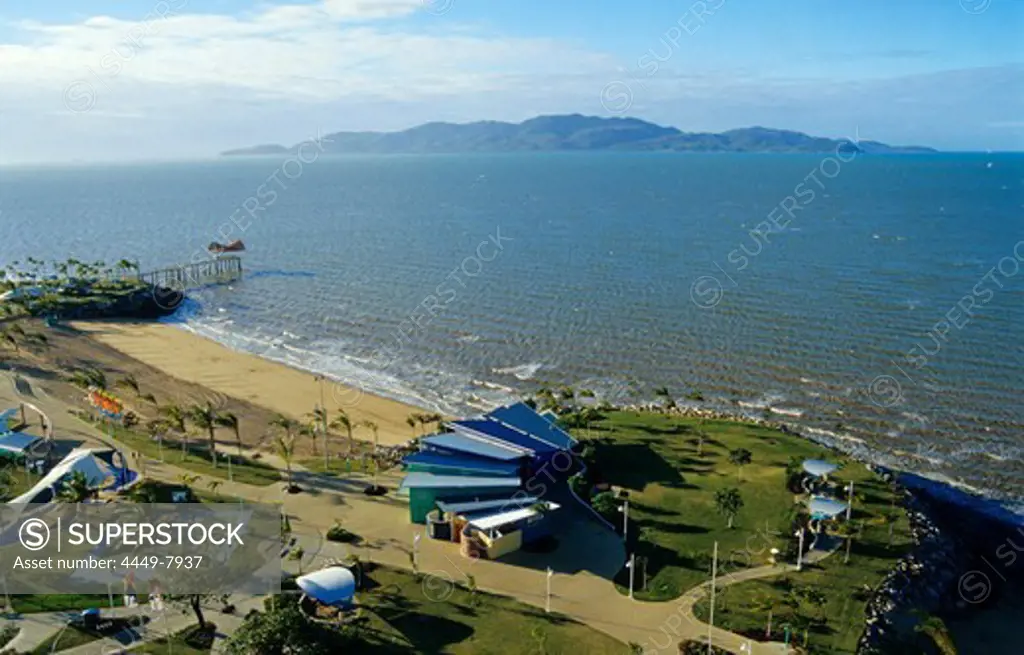 Aerial view of the coast of Townsville, in the background Magnetic Island, Queensland, Australia