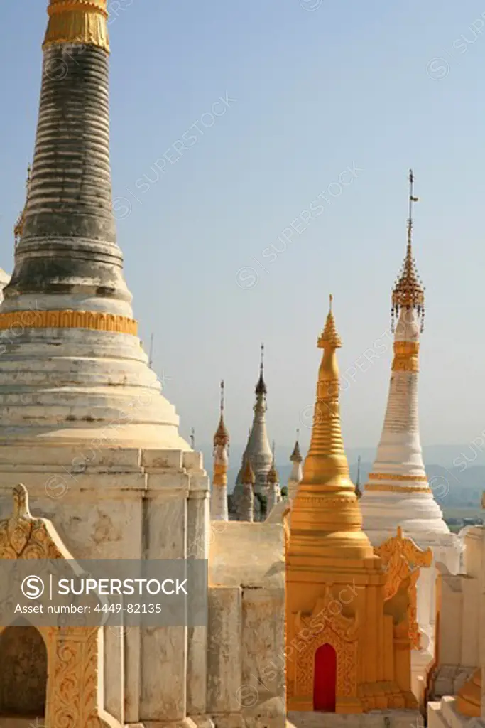 Stupas of the Taung Tho Kyaung Pagoda in the sunlight, Shan State, Myanmar, Burma, Asia