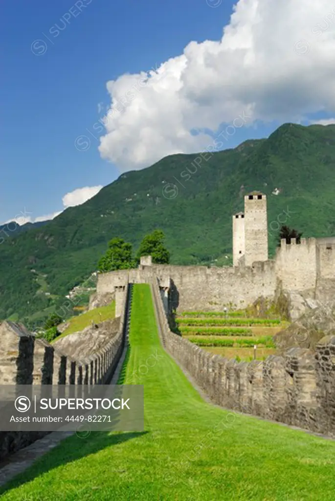 Castle Castelgrande with defence walls, towers Weisser Turm and Schwarzer Turm in UNESCO World Heritage Site Bellinzona, Bellinzona, Ticino, Switzerland
