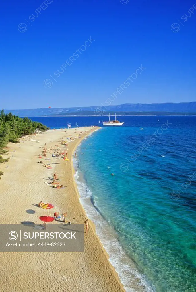 People on the beach on a tongue of land under blue sky, Golden Horn, Brac island, Croatian Adriatic Sea, Dalmatia, Croatia, Europe