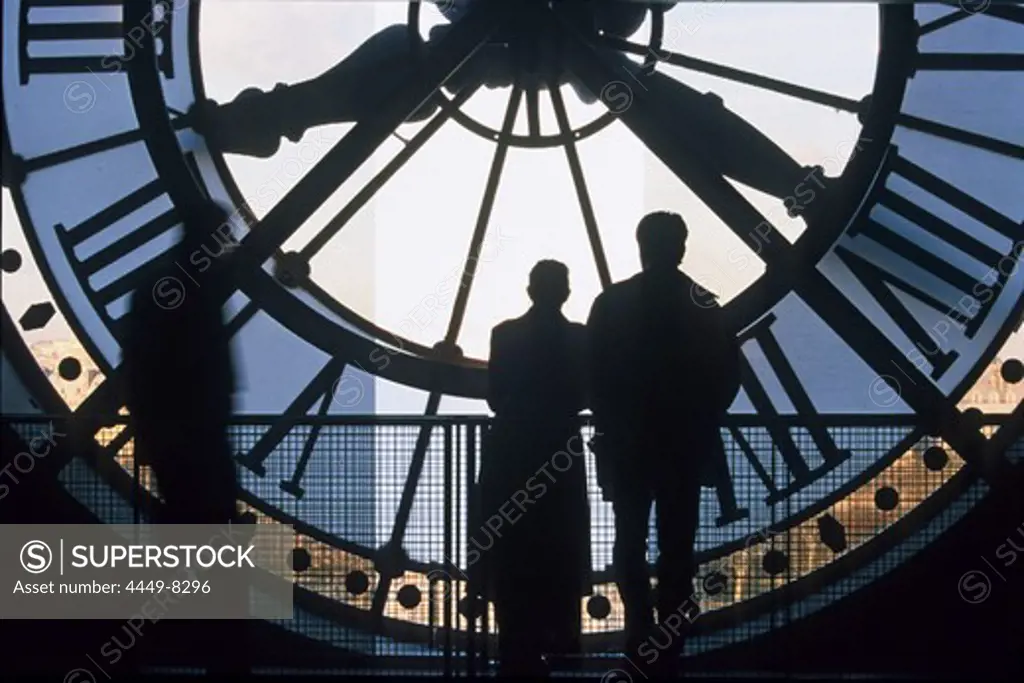 Couple in front of the clock at the Musée d´Orsay, architecture firm Architekturbuero ACT-Architecture, Paris, France