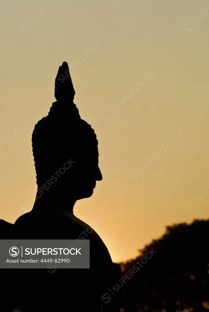 Silhouette of Buddha head, Wat Mahathat, Sukothai Historical Park, Central Thailand, Asia