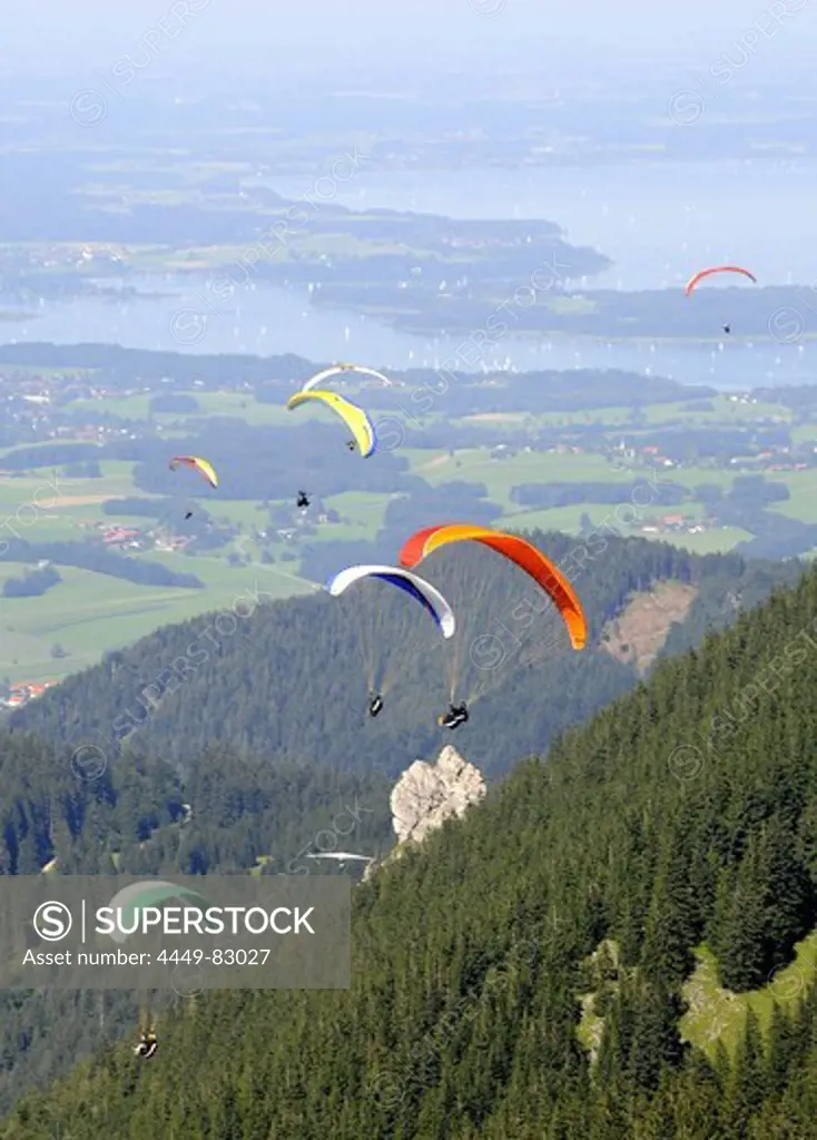 Paragliders at mount Hochries, Chiemgau, Bavaria, Germany