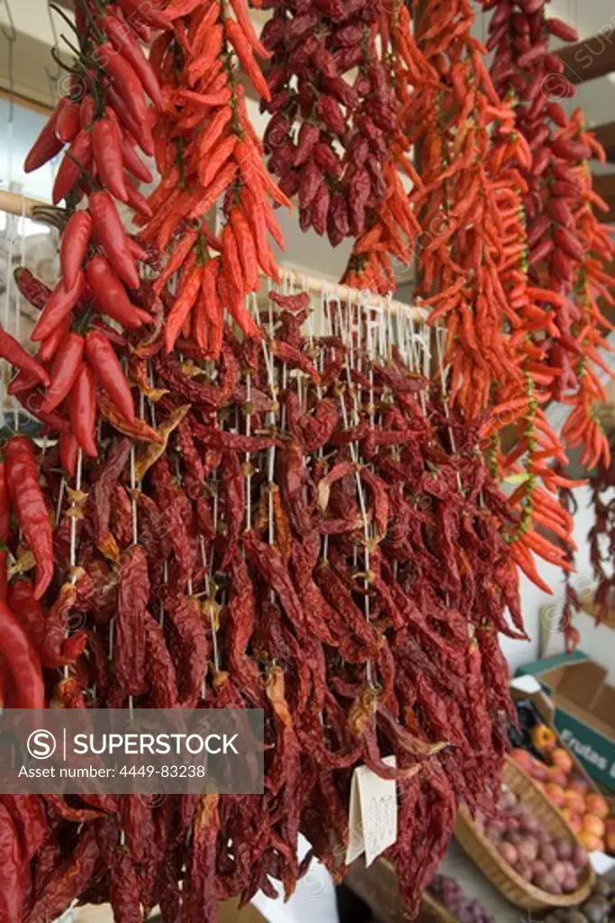 Red pimentos for sale at Mercado dos Lavradores Market Hall, Funchal, Madeira, Portugal