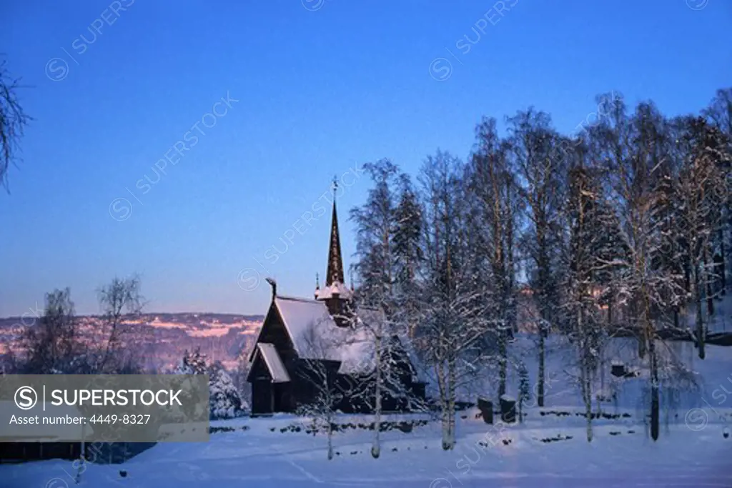 Garmo stave church in snow covered scenery, Maihaugen, Lillehammer, Norway, Scandinavia, Europe