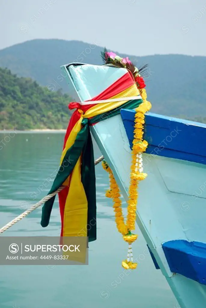 Traditional decoration with flowers on the bow of a fishing boat at the pier in the Bang Bao bay, Koh Chang Island, National Park Mu Ko Chang, Trat, Gulf of Thailand, Thailand, Asia