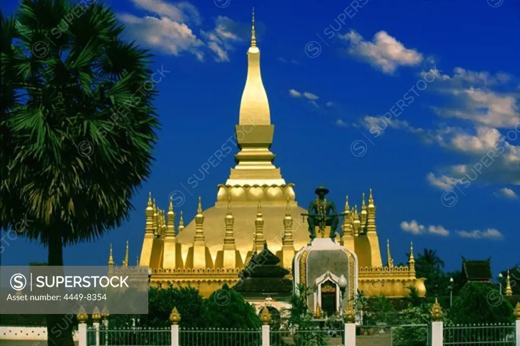 Golden That Luang stupa under blue sky, Vientiane, Laos, Asia