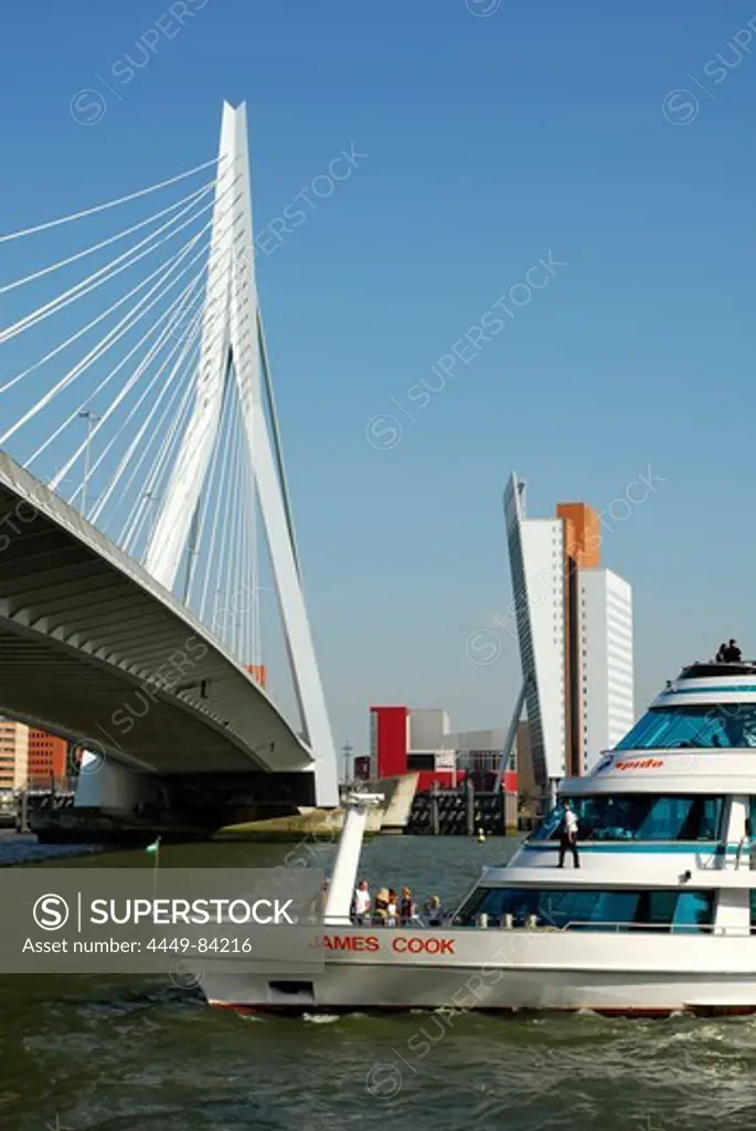 Erasmusbrug, Erasmus bridge and modern architecture at the Wilhelminapier behind excursion boat on the Nieuwe Maas River, Rotterdam, Zuid-Holland, South-Holland, Nederland, the Netherlands, Europe