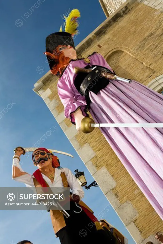 Large figurines at a procession in the city, Festival of Santa Tecla, Sitges, Catalonia, Spain, Europe