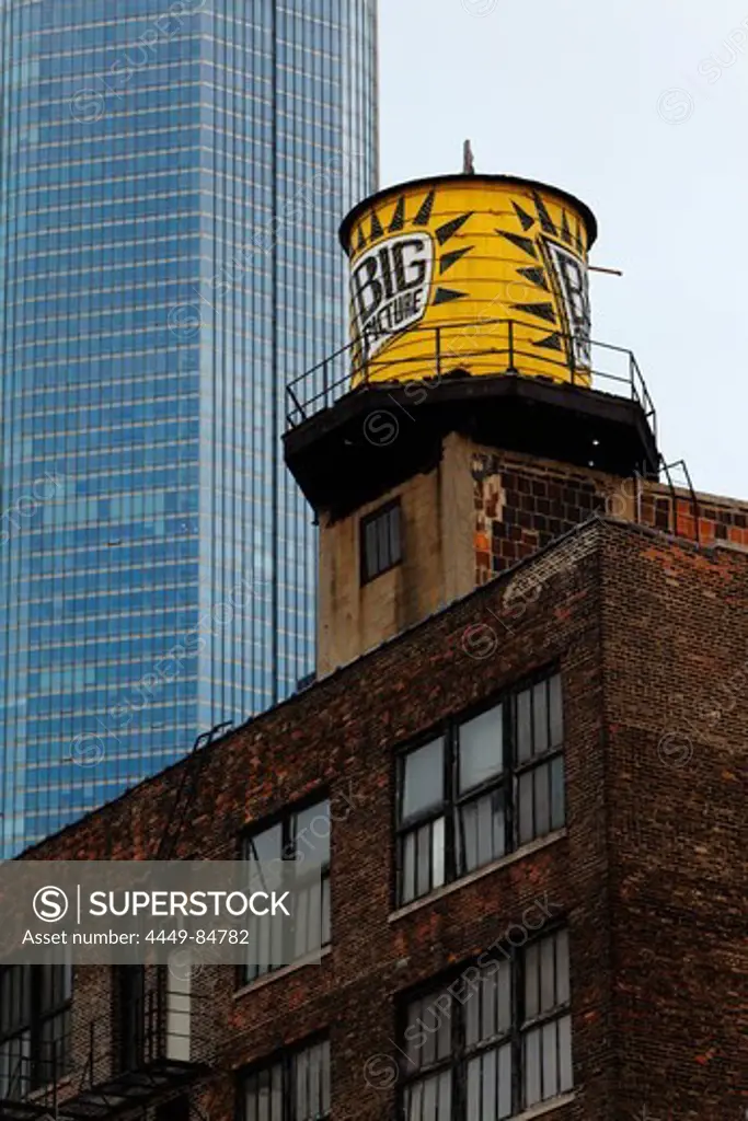 Water tank on a high-rise building, Trump Tower in the background, Chicago, Illinois, USA