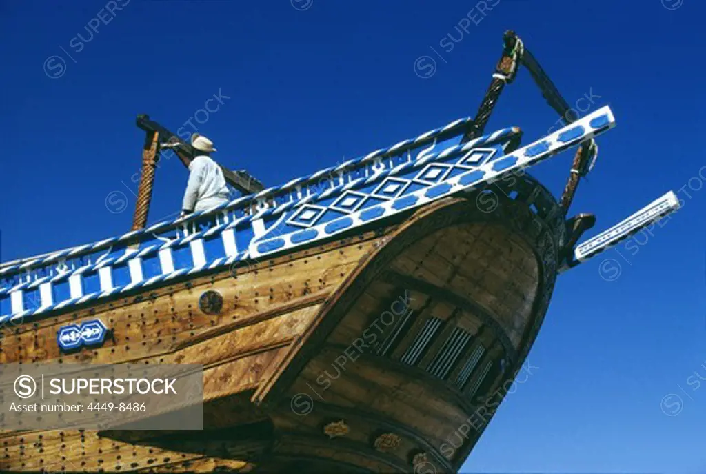 Stern of a Dhau ship under blue sky, Sur, Oman, Middle East, Asia