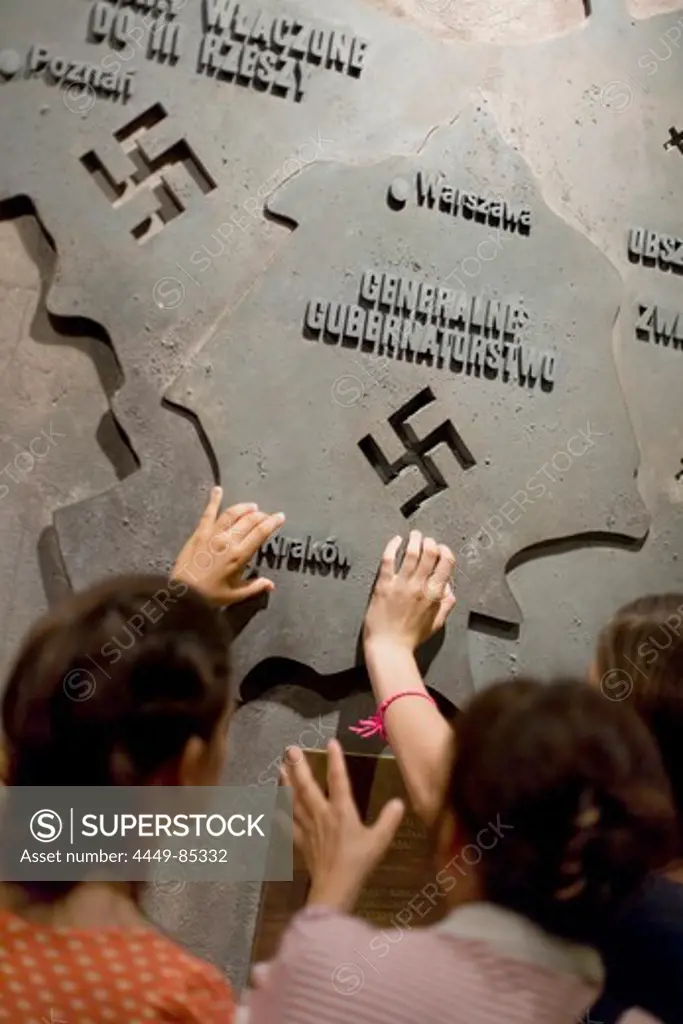 People at an exhibition at the Warsaw Uprising Museum, Warsaw, Poland, Europe
