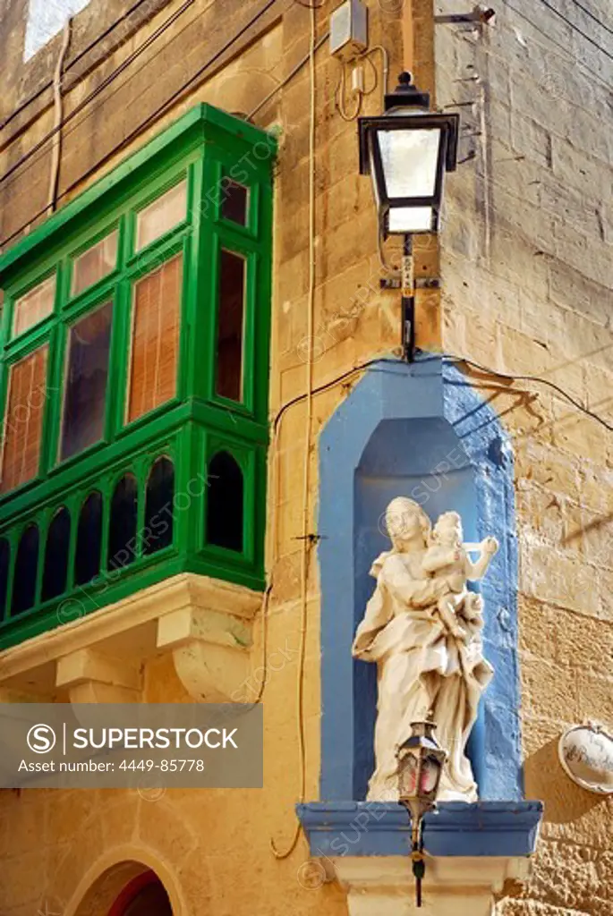 Facade with a Maria sculpture in Victoria, Rabat, Gozo Island, Malta, Mediterranean, Europe