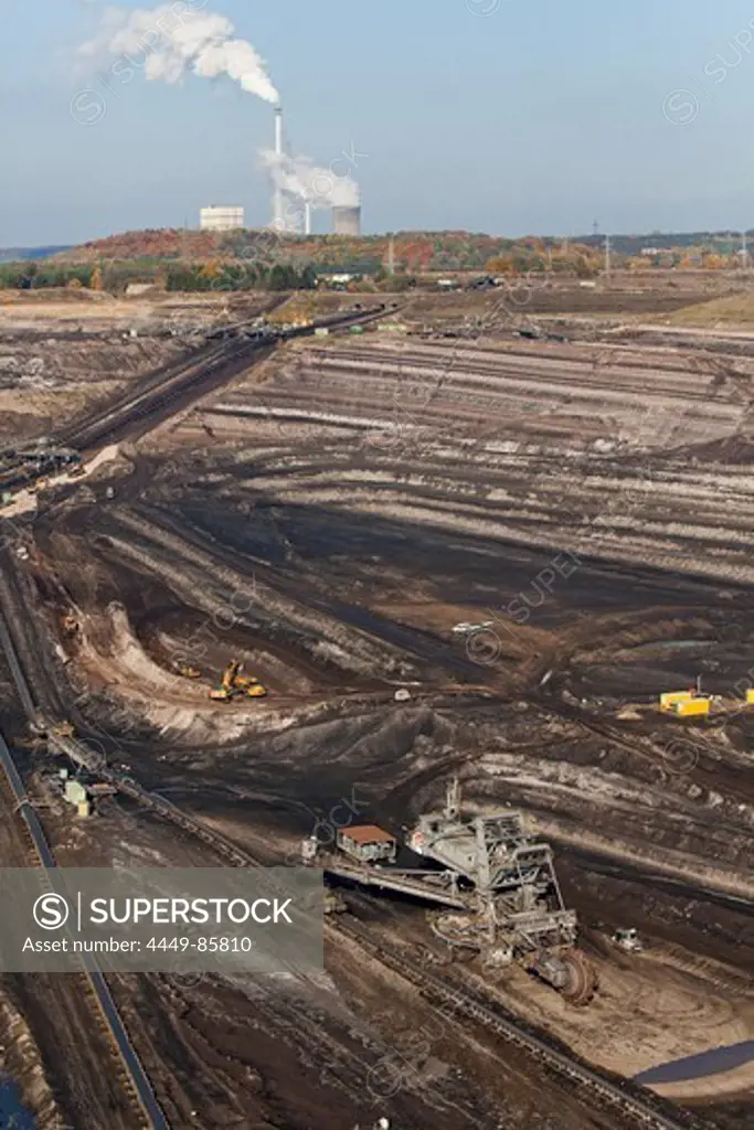 Aerial view of a bucket-wheel excavator with conveyor belt in for open-pit lignite mining, brown coal, Schoeningen, Lower Saxony, Germany