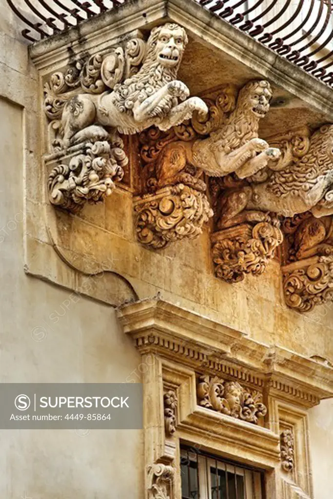 Baroque balcony, Palazzo Nicolai, Noto, Sicily, Italy