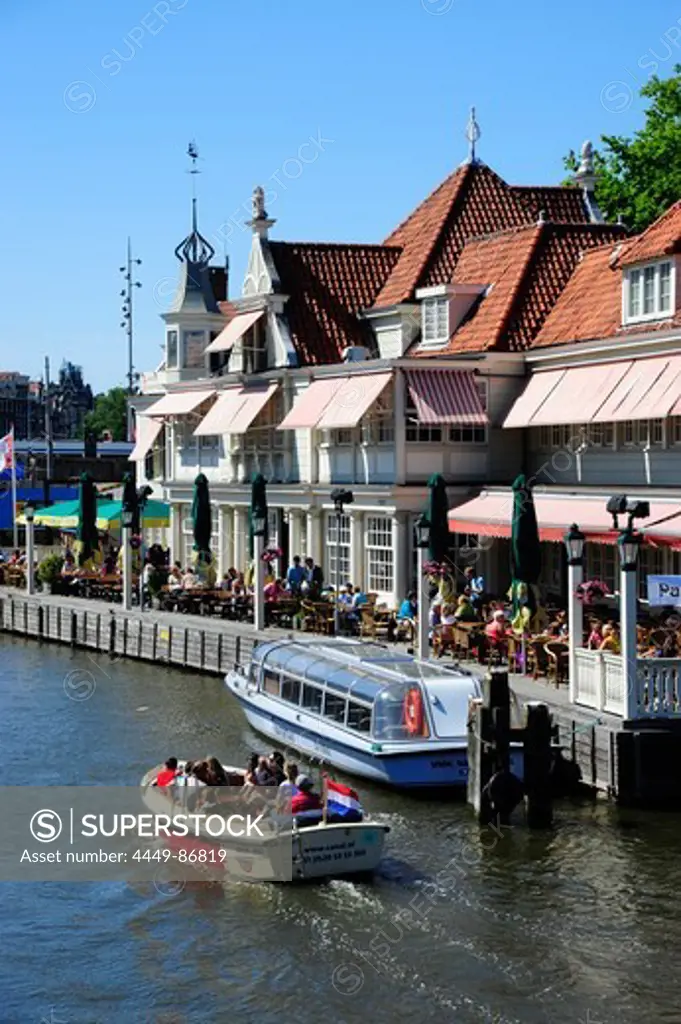 Boats, cafe with terrace at the central railway station, Centraal Station NS, Amsterdam, the Netherlands, Europe