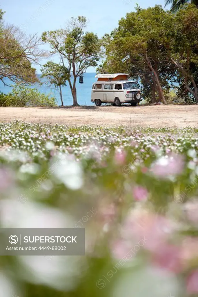 VW camper van at Radical Bay, northeast coast of Magnetic island, Great Barrier Reef Marine Park, UNESCO World Heritage Site, Queensland, Australia