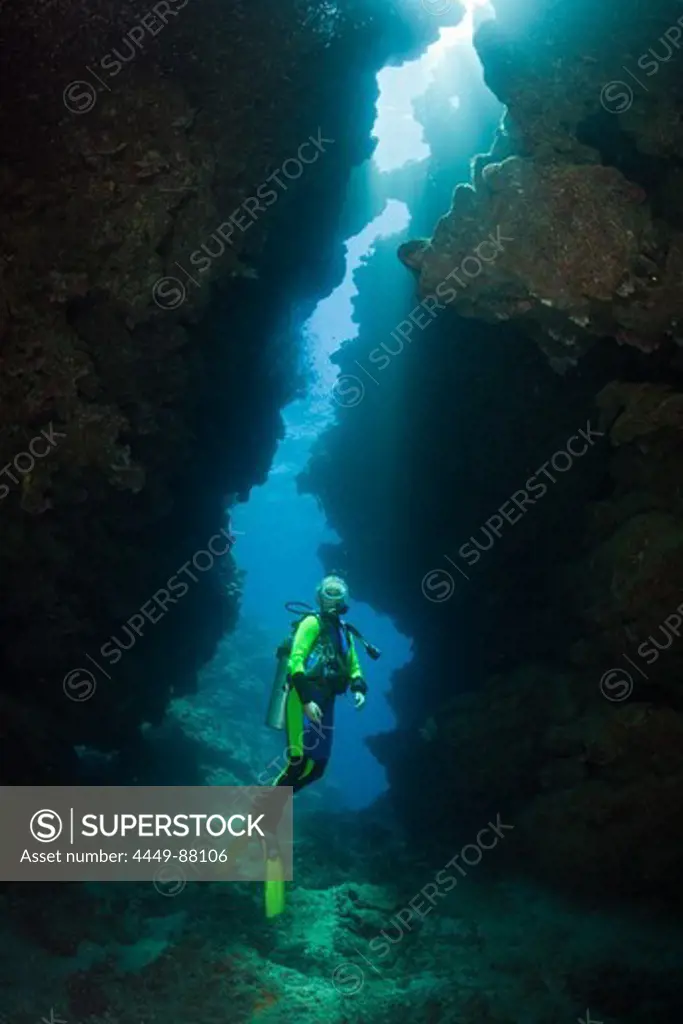 Scuba Diver in Underwater Cave, Namena Marine Reserve, Fiji